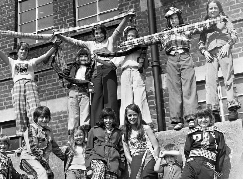 Scottish pop group the Bay City Rollers were all the rage in 1975 and here Wigan fans don the tartan at a fancy dress competition at the ABC Minors on Saturday 7th of June that year.