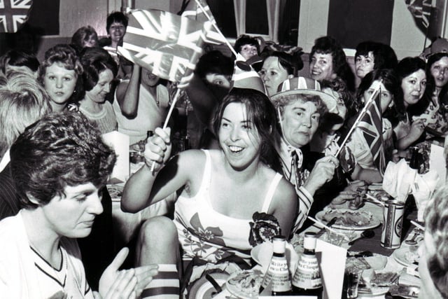 Workers at Coops factory in Dorning Street, Wigan, have a special lunch to celebrate the Queen's Silver Jubilee in 1977.