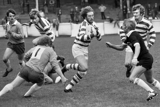 Wigan player/coach George Fairbairn on his way to scoring a try against Huyton in a Division 2 match at Central Park on Sunday 21st of September 1980 which Wigan won 47-8.