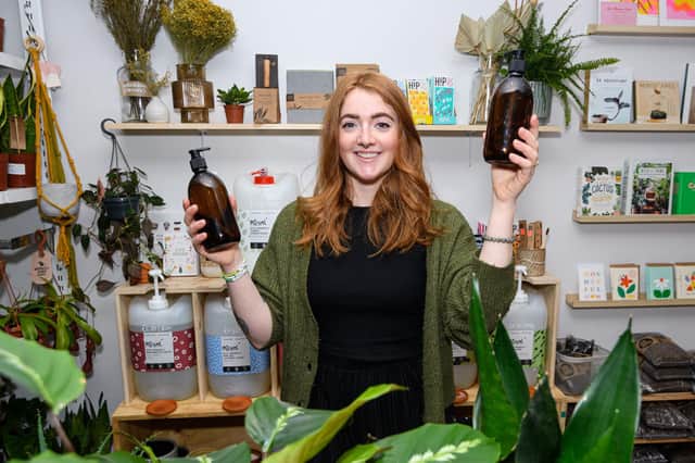 Owner of Little Pot Plants at her zero waste station with reusable containers. Photo: Kelvin Stuttard