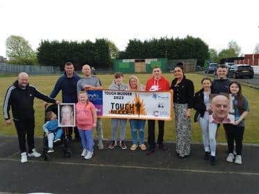 Sara Pilling, centre, with family and friends taking on the Tough Mudder 5k