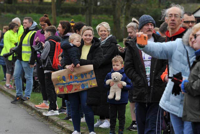 Spectators cheer on the runners in 2023