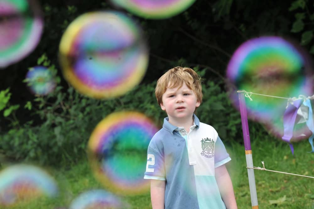 Family fun at A Day to Celebrate Every Child's Right to Play, a free event of fun, games, arts, crafts, entertainment and more at Pennington Flash Nature Reserve, Leigh.