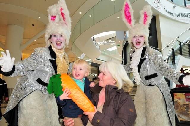Shoppers in the Grand Arcade, Wigan, were met by these two giant bouncing Easter Bunnies. 20 month old Patrick Mort couldn't believe his eyes when he met them with grandma Eileen Yates