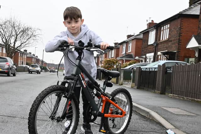 Zac Jackson, seven, is organising a sponsored bike ride to Haigh Hall