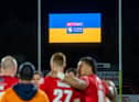 Rugby league players stand in solidarity with Ukraine