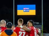 Rugby league players stand in solidarity with Ukraine