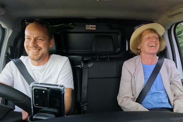 Grayson Perry (right) is being driven around England by white van driver Kirk in Grayson Perry's Full English