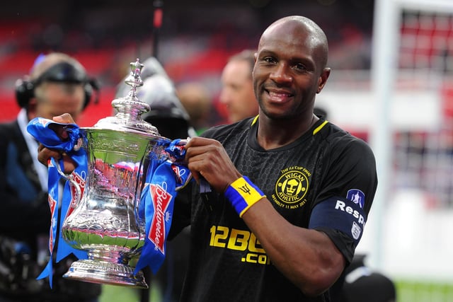 FA Cup winning captain Emmerson Boyce was with Latics between 2006 and 2015.
After leaving the club, he spent a season with Blackpool, before hanging up his boots.
The 43-year-old did come out of retirement briefly to feature for Ashton Town in 2020, and is currently the technical director of Barbados FA.