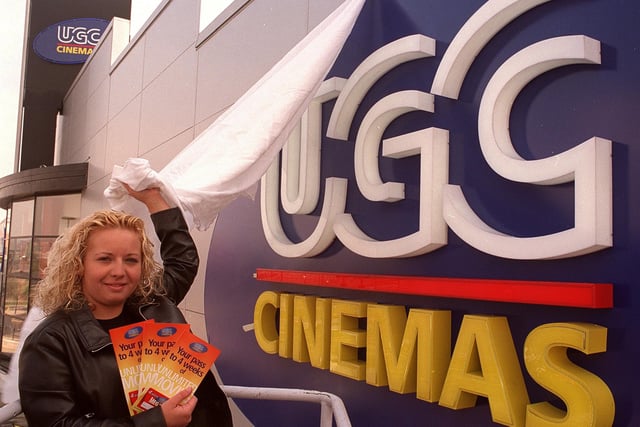 Wigan Evening Post competition winner Helen Woods unveils the UGC Cinema.