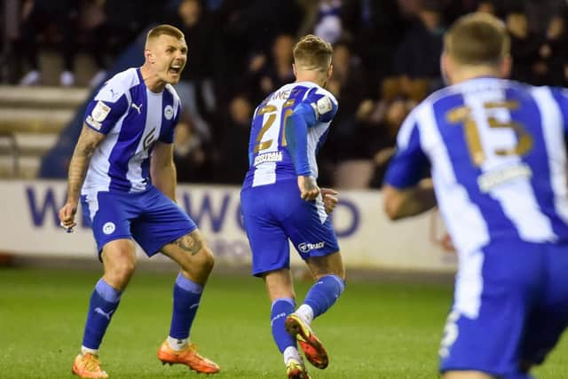 Joe Bennett celebrates his goal