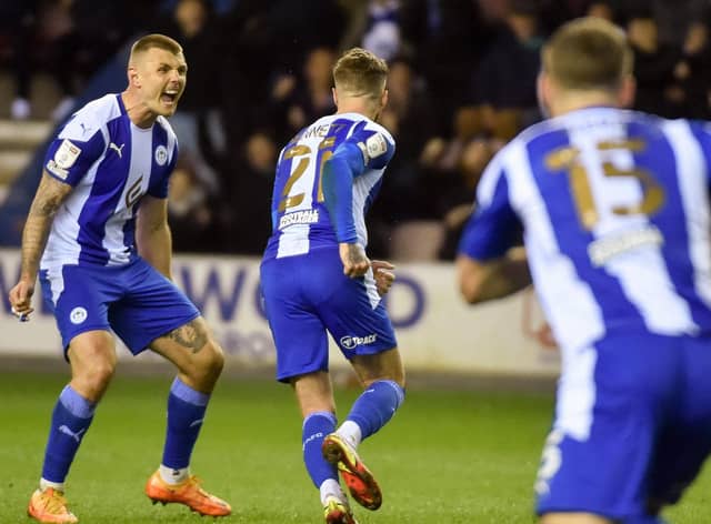Joe Bennett celebrates his goal