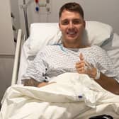 Jason Kerr is in good spirits after undergoing knee surgery