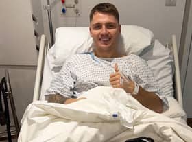 Jason Kerr is in good spirits after undergoing knee surgery