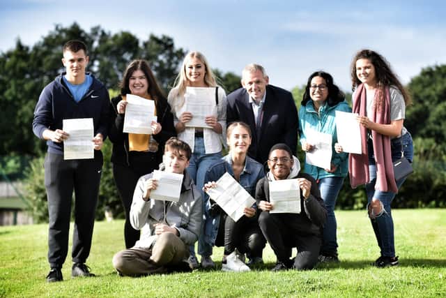 Mr McGhee celebrating with St John Rigby College students on A-level day in 2019