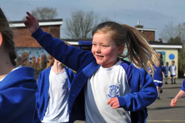 Staff and pupils at Newton Westpark primary school, Leigh, take part in a fund raising run