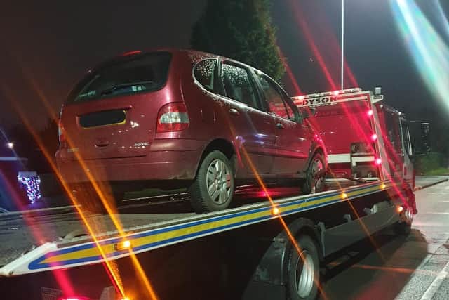 Police seized a car after arresting its driver on suspicion of motoring offences
