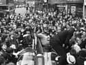 The crowds gather for the arrival of Batman and Robin to open the Green Shield Stamp shop in Crompton Street, Wigan, in 1967.