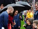 The Princess of Wales meeting the mascots.