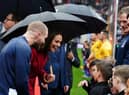 The Princess of Wales meeting the mascots.