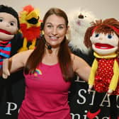 Lisa Lundie of Next STAGE Performing Arts host the Let's Pretend class, delivering stories, dancing and singing with puppets at Shevington Library.