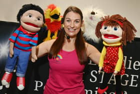 Lisa Lundie of Next STAGE Performing Arts host the Let's Pretend class, delivering stories, dancing and singing with puppets at Shevington Library.