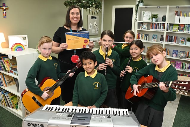 Pupils enjoy a variety of music lessons at St. Bernadette's Catholic Primary School, Shevington.  The school are proud to have been awarded the Music Mark from Wigan Music Service.