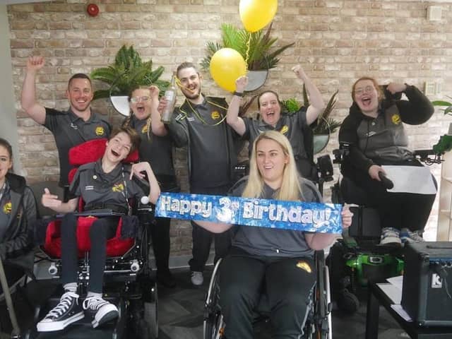 Members of Happy Smiles celebrating its third birthday