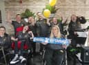 Members of Happy Smiles celebrating its third birthday