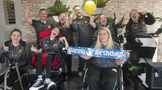 Members of Happy Smiles celebrating its third birthday