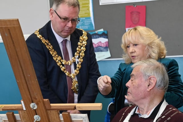 Mayor of Wigan Coun Kevin Anderson visits Marsh Green Art Group, to present the Heart of the Community award.