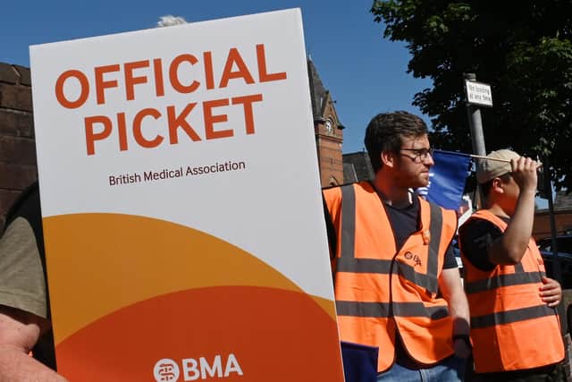 Junior doctors outside Wigan Infirmary on the first of a three-day strike held in June 2023