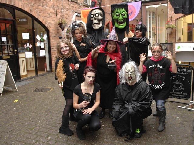 Shopkeepers at Jaxon's Court celebrate their 20th anniversary with a Halloween party in aid of Wigan and Leigh Hospice
