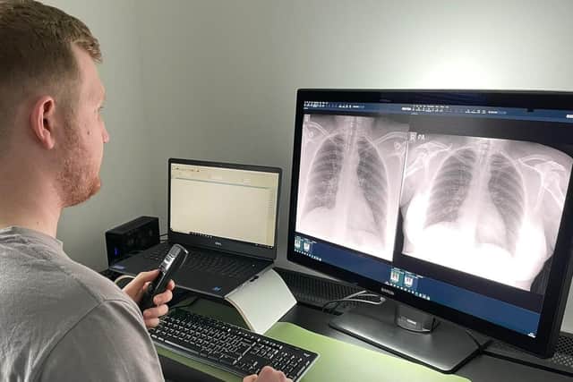 Reporting radiographer Niall Rowlands uses the workstation at home