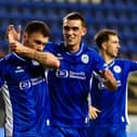Scott Hogan celebrates doubling the Latics lead against Blackpool in midweek