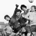 Gary Dickens takes on two defenders and the goalkeeper for the Post and Chronicle Sunday League against Oldham Sunday League in the Lancashire Inter League Tourney quarter-final at Ashton Town's ground on Sunday 21st of December 1980.
The Post League won in a competition record win 11-2.