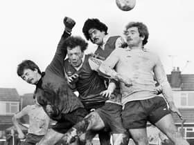 Gary Dickens takes on two defenders and the goalkeeper for the Post and Chronicle Sunday League against Oldham Sunday League in the Lancashire Inter League Tourney quarter-final at Ashton Town's ground on Sunday 21st of December 1980.
The Post League won in a competition record win 11-2.
