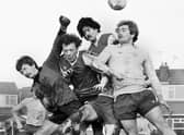Gary Dickens takes on two defenders and the goalkeeper for the Post and Chronicle Sunday League against Oldham Sunday League in the Lancashire Inter League Tourney quarter-final at Ashton Town's ground on Sunday 21st of December 1980.
The Post League won in a competition record win 11-2.