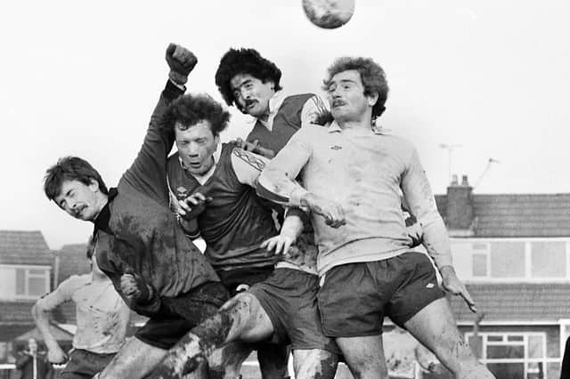 Gary Dickens takes on two defenders and the goalkeeper for the Post and Chronicle Sunday League against Oldham Sunday League in the Lancashire Inter League Tourney quarter-final at Ashton Town's ground on Sunday 21st of December 1980.
The Post League won in a competition record win 11-2.