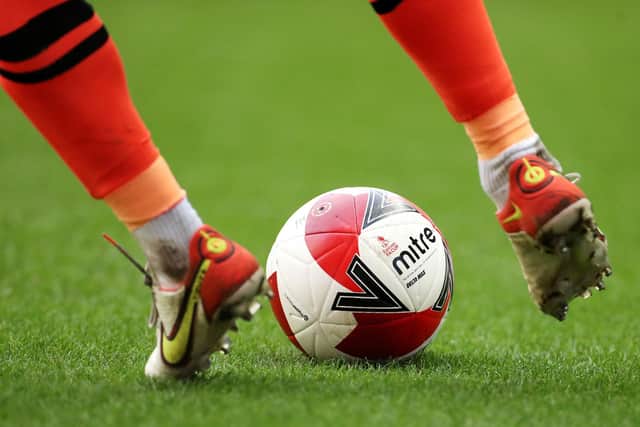 WIGAN, ENGLAND - JANUARY 08: The Mitre Delta Max Emirates FA Cup match ball is seen during the Emirates FA Cup Third Round match between Wigan Athletic and Blackburn Rovers at DW Stadium on January 08, 2022 in Wigan, England. (Photo by Lewis Storey/Getty Images)