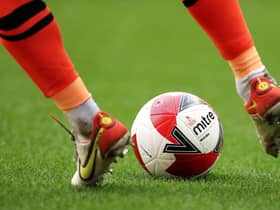 WIGAN, ENGLAND - JANUARY 08: The Mitre Delta Max Emirates FA Cup match ball is seen during the Emirates FA Cup Third Round match between Wigan Athletic and Blackburn Rovers at DW Stadium on January 08, 2022 in Wigan, England. (Photo by Lewis Storey/Getty Images)