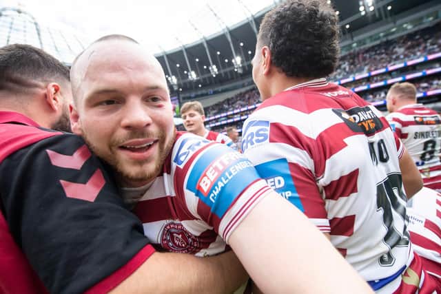 Liam Marshall celebrates after scoring the match-winning try for Wigan Warriors in the 2022 Challenge Cup final