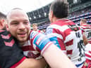 Liam Marshall celebrates after scoring the match-winning try for Wigan Warriors in the 2022 Challenge Cup final