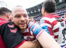 Liam Marshall celebrates after scoring the match-winning try for Wigan Warriors in the 2022 Challenge Cup final