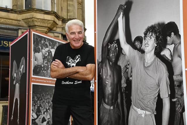 Francesco Mellina posed with his photographs during Wigan's 50th anniversary celebrations