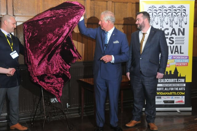 April 2019 
Prince Charles unveils a plaque at the old courts, pictured with Jonathan Davenport director, left,  David Jenkins, right, managing director at The Old Courts, Wigan.
