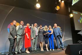College staff receiving award