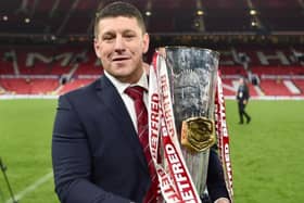 Matty Peet parades the Super League trophy