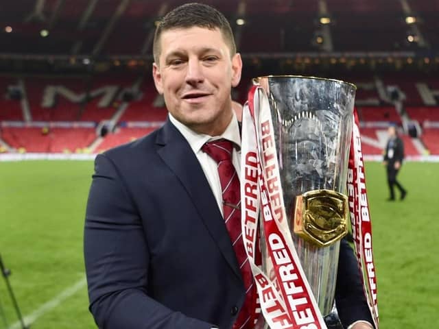 Matty Peet parades the Super League trophy