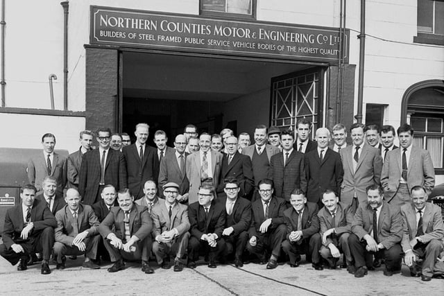 Workers from Northern Counties on Wigan Lane gather ready to set off on a day trip in the 1960s.